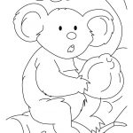 Koala trzymający dużą dynię, do kolorowania dla dzieci.