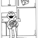 Elmo z Ulicy Sezamkowej trzymający serce i prezent.